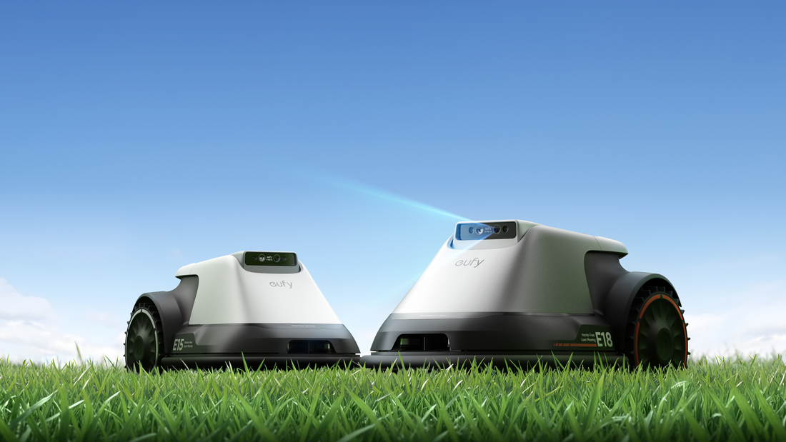 eufy robotgräsklippare utan slinga – E15 och E18 på grön gräsmatta mot blå himmel